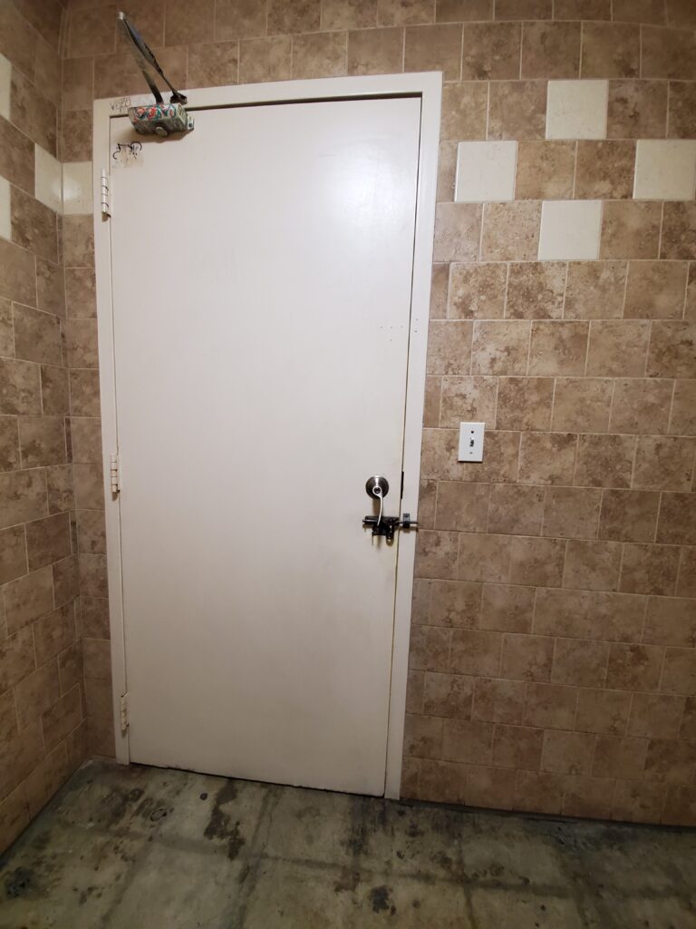 LA Gun Club restroom door